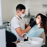 a women is getting dental treatment