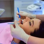 a women is getting dental treatment