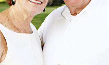 Photo of confident, smiling older couple